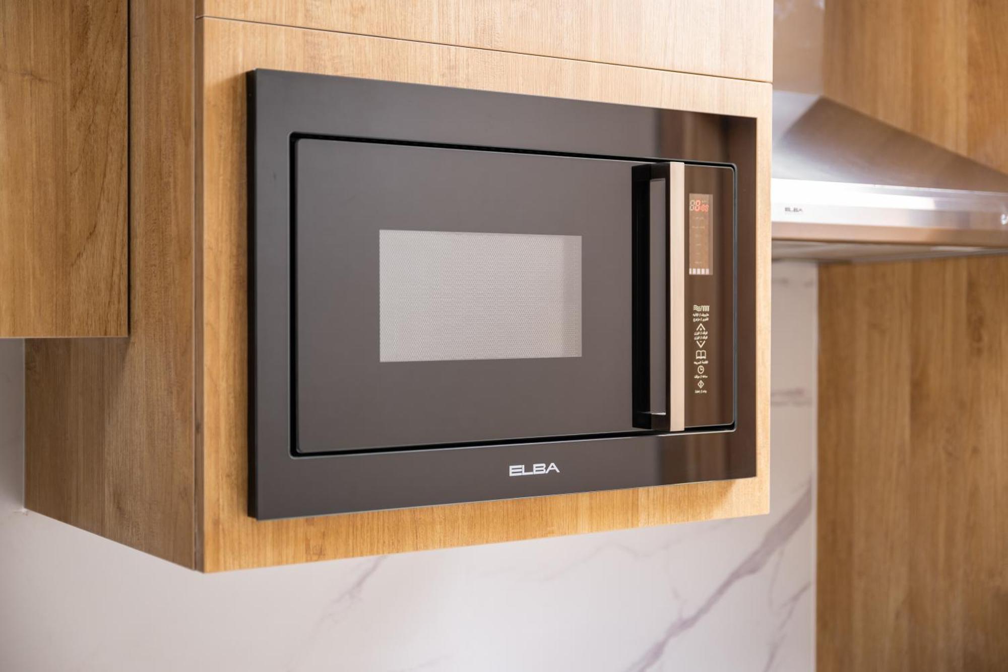 Taiba Suites Madinah Медина Екстериор снимка Microwaves are a common household appliance.